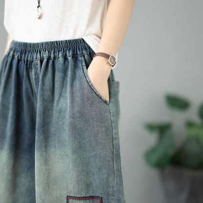 Embroidered Elastic-Waist Cropped Wide-Leg Jeans